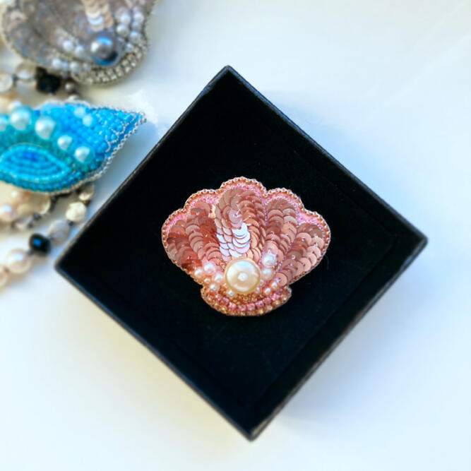 The shell brooch