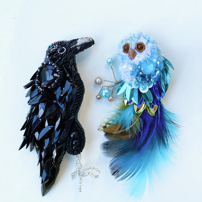 The raven and the owl brooches